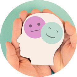 Carita feliz y triste en manos